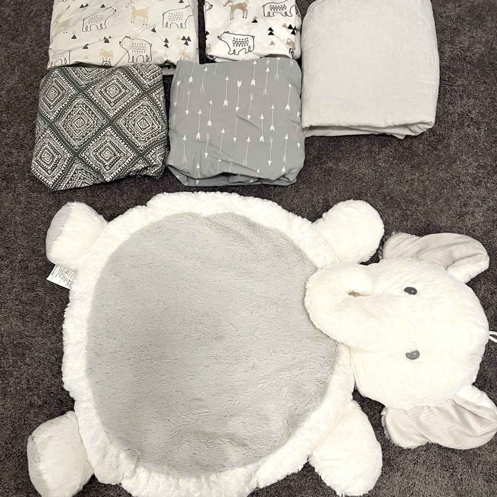 Gently used woodland themed baby bedding and accessories.